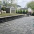 interlocking paver patio paving installation with retaining wall