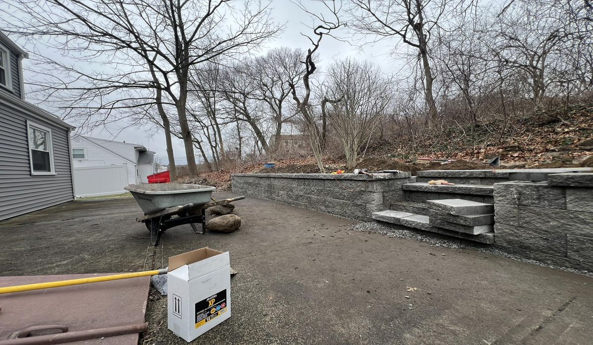 Professional retaining wall and paving construction project by experienced contractors