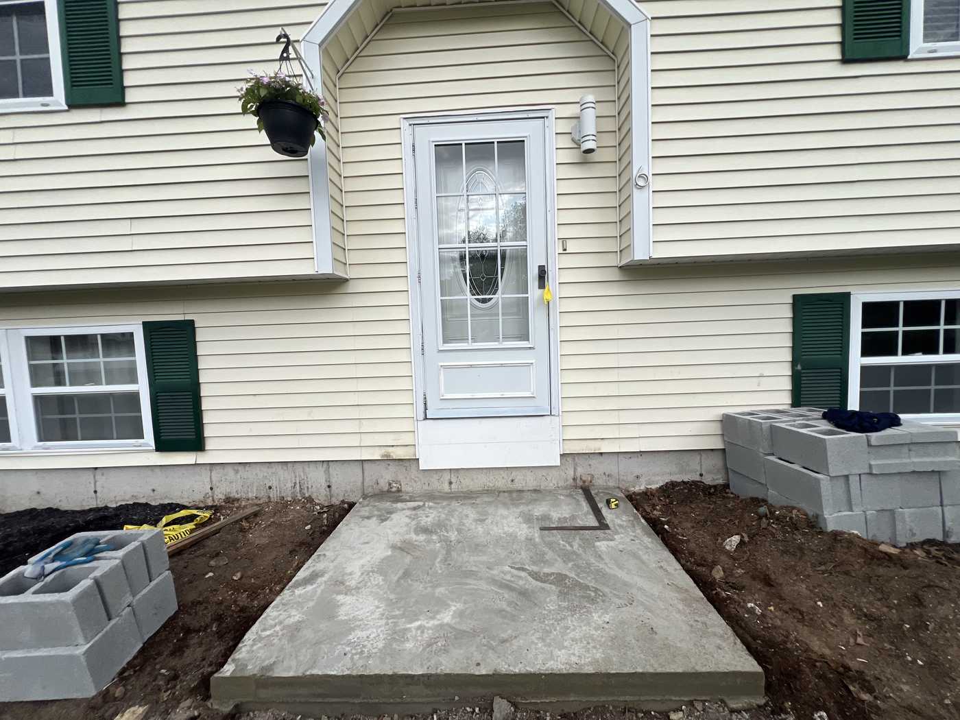 driveway paving before after Concrete paving work in Brighton, Massachusetts