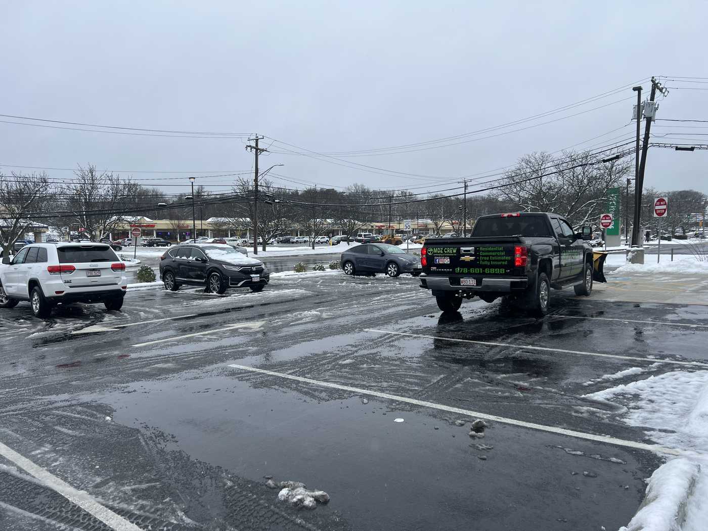 parking lot asphalt MDZ Crew paving contractor in Lexington, Massachusetts