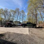 when to call a paving contractor driveway equipment when to call a paving contractor truck with skid steer preparing driveway for paving work