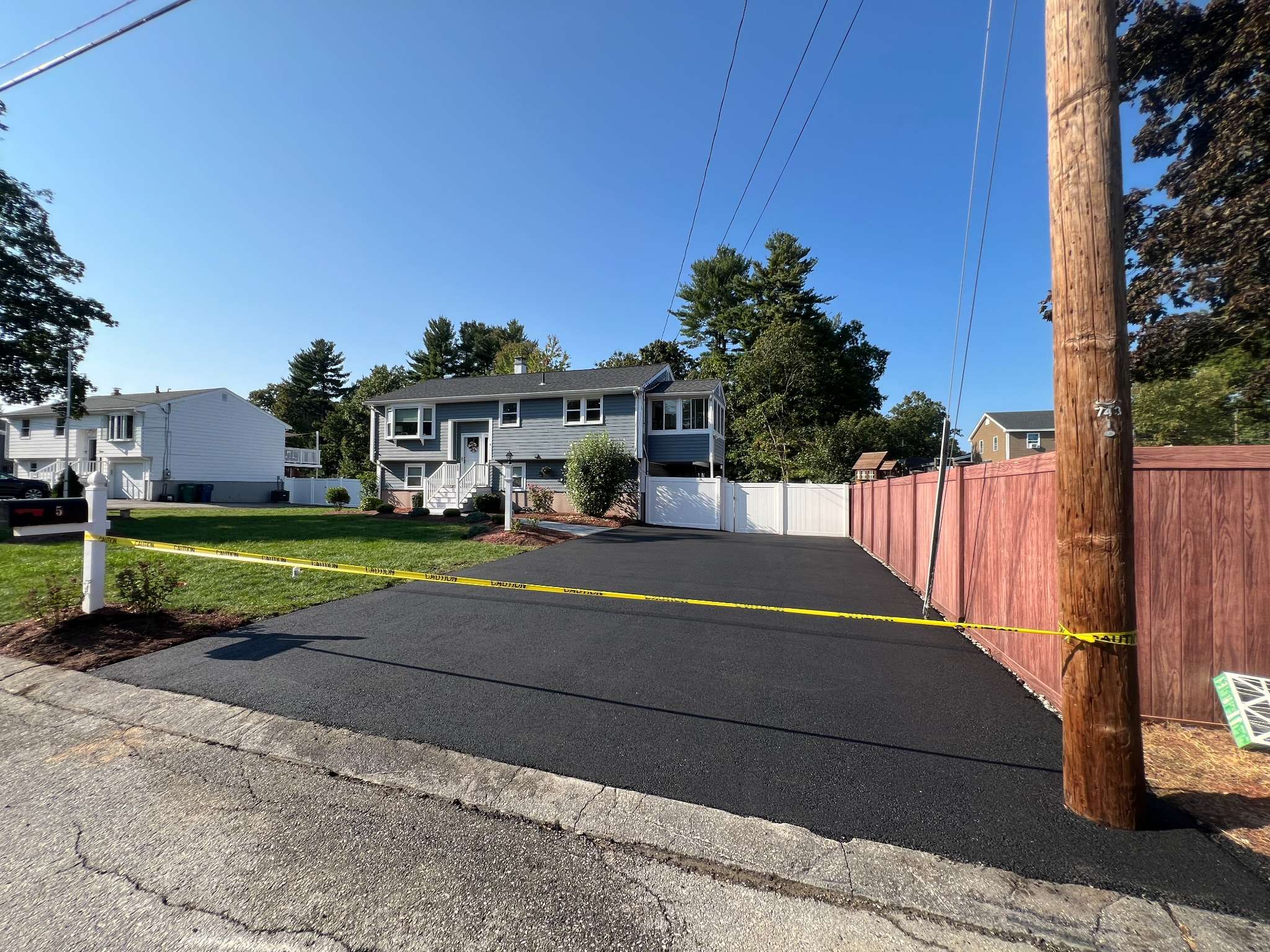 asphalt driveway installation paver patio transformation Asphalt Driveway Installation and Paver Patio Transformation