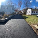 professional driveway paving services asphalt driveway Freshly paved residential asphalt driveway completed by MDZ Crew Landscaping with professional driveway paving services.