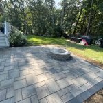 paver patio with fire pit Custom paver patio with fire pit and modern backyard hardscape by MDZ Crew Landscaping & Paving Inc.